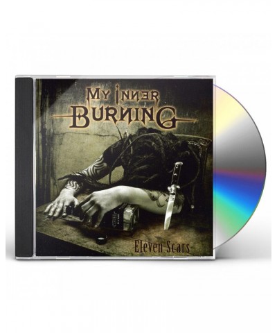 My Inner Burning ELEVEN SCARS CD $12.56 CD